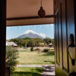 Hotel Boutique Victoria - Habitacion foto vista panoramica al volcan